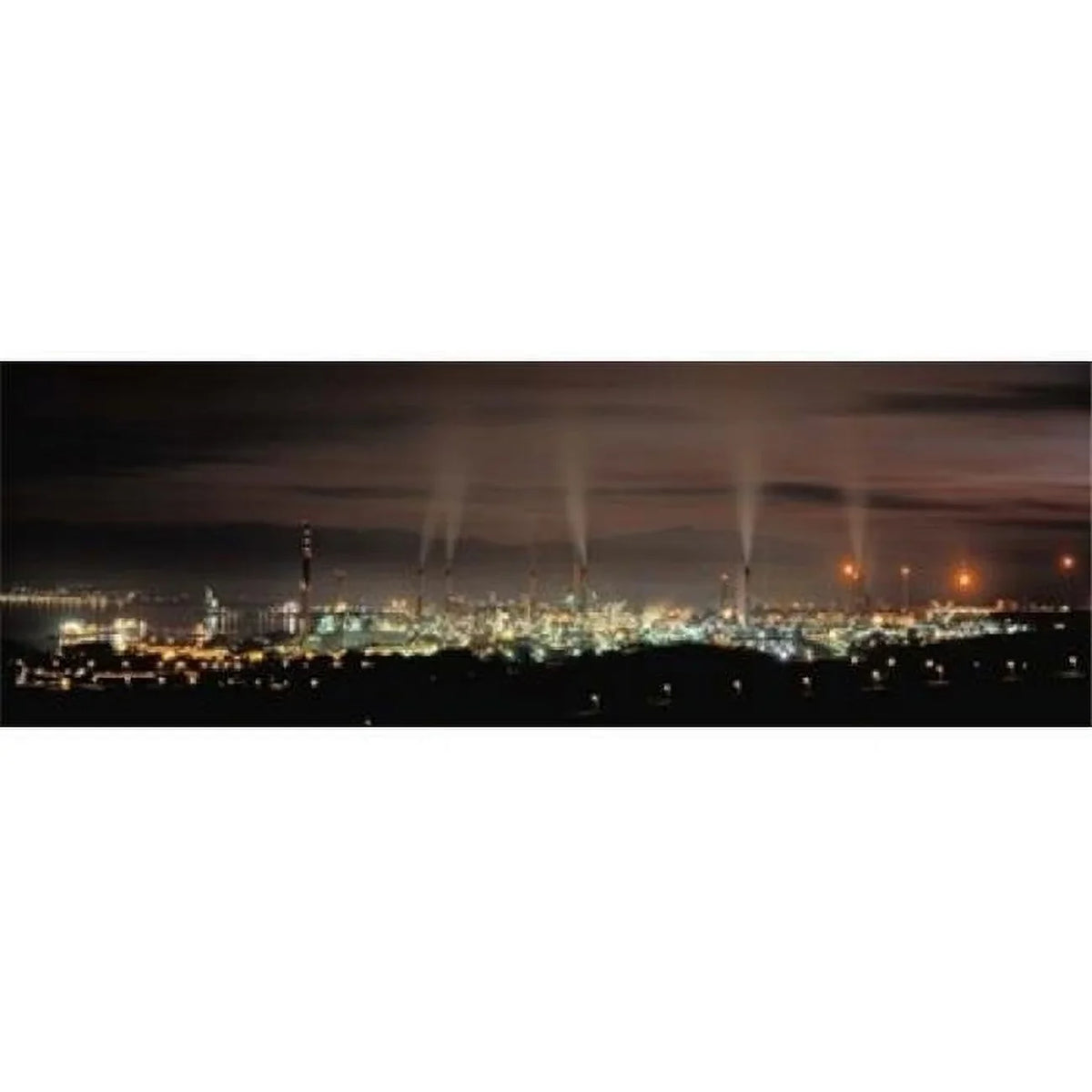 High angle view of oil refinery at lit up at night La Linea De La Concepcion Andalusia Spain Poster Print by - 36 x 12